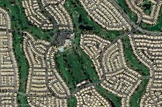 an aerial view of many rows of houses