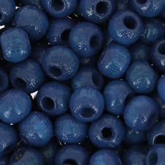 blue ceramic beads with holes in the middle