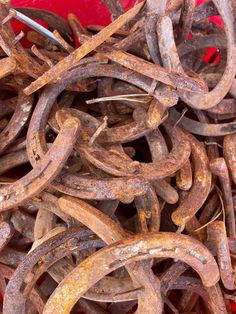 a pile of rusty metal rings sitting on top of each other