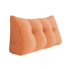 an orange pillow on a white background