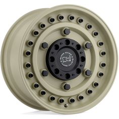 an image of a wheel with holes on the front and rear wheels in beige color