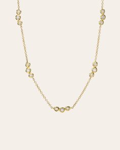 14k solid yellow gold necklace with 15 bezel diamonds hanging around the neck line. Uber chic and dainty, wear it by itself or layered. Comes with a 14''-16'' adjustable chain. Diamond Carat Weight: Approx. 0.19 ctw Size of Bezel Segments: Approx. 9mm each Diamond Quality: VS Total Weight: Approx. 2 grams Ships in 4-7 business day Rush orders ship in 2-5 business days Diamond Charm Necklace, Monogram Necklace Gold, Thick Hoop Earrings, Custom Jewelry Box, Dainty Diamond Necklace, Chain Diamond, Gold Letter Necklace, Bezel Necklace, Gold Bead Bracelets