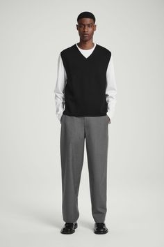 These directional pants sit on the more formal end of the COS menswear collection. Crafted from 100% wool-hopsack, they're shaped for a relaxed fit with wide, full-length legs and subtle side pleats. Style them with a shirt and a pair of Derbies.  Relaxed fitTailored waistband, back welt pocketCertified according to the Responsible Wool Standard, to protect the welfare of the sheep and their environment 100% RWS Wool / Dry clean Side seam length of size 32R is 41.85" / Model wears a size 32R Cos Menswear, Land Management, Menswear Collection, Trouser Suits, Derby, Sheep, Full Length, Top Brands, Dry Clean