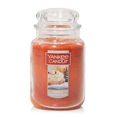 yankee candle jar filled with cinnamon rolls