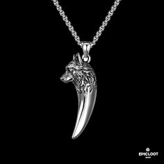 Embrace your inner warrior with this fierce Wolf Necklace, a testament to the strength and resilience of the Viking spirit. Crafted with meticulous attention to detail, this Viking necklace features a intricately designed wolf pendant, its piercing eyes and bared fangs a symbol of courage and tenacity. Wear this necklace as a reminder of your own untamed power and let it guide you through life's battles. - Chain length: 60cm - Chain width: 3.0mm - Pendant length: 50.6mm - Pendant width: 22mm - T Werewolf Necklace, Werewolf Oc, Nordic Symbols, World Serpent, Beautiful Wolf, Symbol Of Courage, Mjolnir Pendant, Piercing Eyes, Wolf Pendant