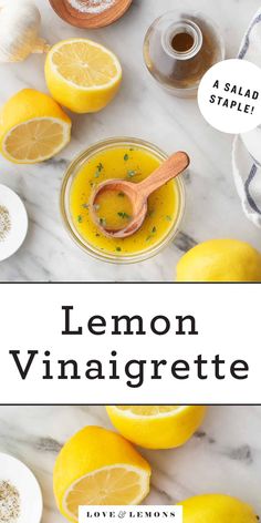 lemon vinaigrette in a glass jar next to sliced lemons