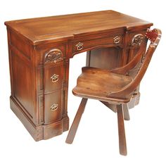 an antique wooden desk and chair on white background