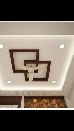 a ceiling fan mounted to the ceiling in a living room