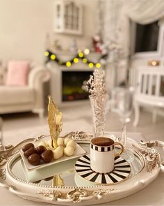 a tray with some food on it and a cup of coffee in the centerpiece