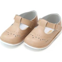 a pair of baby shoes on a white background