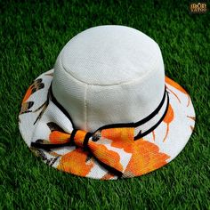 A white summer panama hat with orange flower print detail. It is a beautiful and charming hat to take everywhere with you in Summer. This beautiful orange flower print gives you the Summer bright lively vibe.Hat material: Rice strawDimension (cm): 30L x 30W x 12.5H White Panama Hat With Short Brim For Spring, White Curved Brim Panama Hat For Spring, Summer Orange Adjustable Sun Hat, Adjustable Summer Sun Hat In Orange, Orange Adjustable Summer Hat, Casual Orange Straw Hat For Spring, Adjustable Orange Summer Sun Hat, Adjustable Orange Sun Hat For Summer, Adjustable Orange Summer Hat