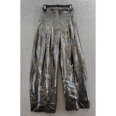 Alberta Ferretti Metallic Silk Wide-Leg Pants Womens 2 Dark Gray Pleated Zip Fly Alberta Ferretti Metallic Silk Wide-Leg Pants Womens 2 Dark Gray Pleated Zip Fly Retail $1390.00 Elevate Your Wardrobe With These Stunning Metallic Silk Wide-Leg Pants By Alberta Ferretti. The Dark Gray Pants Feature A Pleated Front, Zip Fly Closure, And A Waist Size Of 28 Inches. Perfect For Casual Occasions, The Pants Have A Regular Fit And A High Rise Of Greater Than 10.5 Inches. Crafted From A Blended Fabric Of Silk High-waisted Wide Leg Pants For Party, High Waist Silk Pants For Formal Occasions, Silk High-waisted Pants For Party, Silk Wide-leg Pants For Party, Silk Party Trousers, Grey Satin Wide Leg Pants, Glamorous Silver Wide-leg Pants, Fitted Metallic Wide-leg Pants, Glamorous Silver Full-length Pants