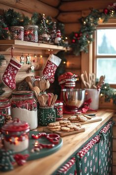 a kitchen counter topped with cookies and christmas stockings