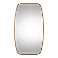 a rectangular mirror with gold trimmings on the edges and bottom edge, against a white background