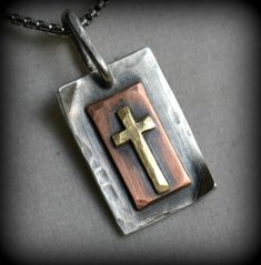 "Completely handcrafted through metalwork, in Asheville, NC. No mass production is involved. Much love and care is put into each ring. These are built to last. Materials: .999 fine silver, copper & brass Choose which chain you want at purchase. Either .925 Sterling silver chain or a stainless steel military dog tag style chain. See the last 2 photos to see the 2 different chains. The stainless steel dog tag chain comes in longer lengths and is the most durable option. .925 sterling silver ch Military Dog Tag, Rustic Wedding Bands, Rustic Cross, Military Dog, Rustic Necklace, Dog Tags Military, Cross Jesus, Hand Stamped Necklace, Copper Material