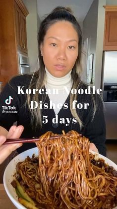 a woman holding a bowl of noodles with chopsticks in her hand and the words korean noodle dishes for 5 days