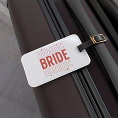 Make your bridal journey unforgettable with our elegant "Bride" luggage tag. Crafted to adorn your luggage with sophistication and style, this tag serves as a chic reminder of the exciting adventure ahead. Whether jet-setting to your dream destination or embarking on your honeymoon getaway, let this tag mark your luggage with love and anticipation. Designed for the modern bride, it's the perfect accessory to accompany you on your special journey and beyond. *100% acrylic Suitcase Tags, Travel Tags, Bachelorette Trip, Travel Luggage Tag, Elegant Bride, And So The Adventure Begins, Jet Set, Travel Luggage, Luggage Tags