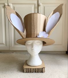 a paper hat with bunny ears on it