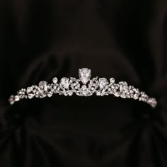 a wedding tiara on a black background