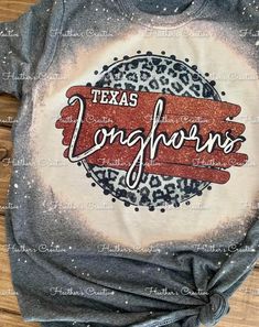 Show some spirit with a Texas Longhorn shirt!   size Large is sold out in dark gray until further notice Custom made to order and every shirt is unique and is made just for you!  The shirts are extremely soft. The shirts are unisex. Shirts will be mailed 1-2 weeks after placing order.  I can't wait to get your one if a kind shirt started! Texas Longhorn Tshirt, Texas Longhorn Shirt, Longhorn Shirt, Texas Longhorns Shirts, Womens Graphic Tees, Bleached Shirt, Texas Longhorn, Texas Longhorns, Shirt Ideas