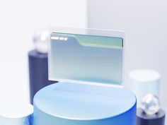 a close up of a blue and white container with a card holder on top of it