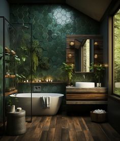 a bathroom with a tub, mirror and plants on the wall next to the sink