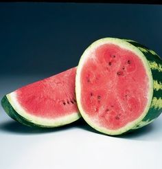 two slices of watermelon sitting on top of each other