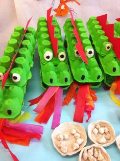 some very cute looking items made to look like alligators with eyes and teeth on them