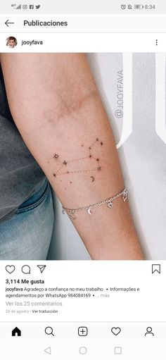 a person with a tattoo on their arm that has the zodiac sign pisciu