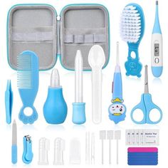 an assortment of toothbrushes, combs and other items in a blue case