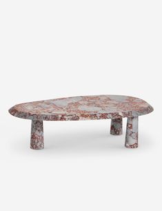 a marble coffee table with two legs and an oval shaped design on the top, against a white background