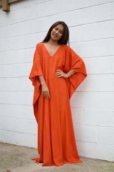 Plain Kaftan Dress, Solid V-neck Beach Cover-up Dress, Summer V-neck Kaftan For Party, Orange V-neck Maxi Dress For Beach, Flowy Solid Dress For Beach Cover-up, Orange Kaftan With Kimono Sleeves For Spring, Orange Spring Kaftan With Kimono Sleeves, Chic Solid Color Beach Cover-up Dresses, Flowy V-neck Maxi Dress For Holiday