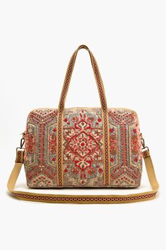 Indulge in the allure of intricate tapestry design, each thread carefully placed by skilled hands to create a visual symphony of opulence. The hand-embroidered details add depth and dimension, making every inch of this Royal Tapestry Duffel Bag a canvas of artistry. Each piece is a testament to the dedication of our artisans. Thoughtfully designed to accommodate your daily essentials without compromising on style. This weekender can be used as a Tote , Crossbody or A duffle for a stylish getaway October Style, Carpet Bag Purse, Weekend Duffle Bag, Leopard Bag, Tapestry Bag, Carpet Bag, Duffel Bags, Embroidered Details, Cute Purses