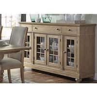 a wooden cabinet with glass doors in a room