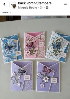 four different cards with butterflies and flowers on them