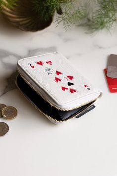 A white leather purse styled as a 9 of hearts playing card. Statement Purse, Card Purse, St George, Playing Card, Queen Of Hearts