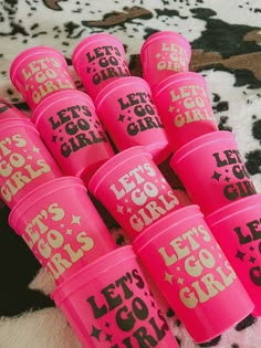 "Super cute hot pink \"Lets Go Girls\" cups featuring a cowgirl hat and custom names. Comes in three options: Black, Tan, or White. Skip the disposable cups and handwritten names and stock up on these for your next event! Perfect for Bach parties; themed parties or outdoor use at the pool or lake. Fully customizable with the names phrases and color schemes of your choice-simply put your requests in the personalization section at checkout. Feel free to message to bounce around ideas or custom req 21st Birthday Party Themes For Her, Cowgirl Party Ideas For Women, Sweet Sixteen Cowgirl Theme, Sweet 16 Cowgirl Theme, Pink Cowprint Birthday Party, Shania Twain Birthday Theme, Pink Country Party, Pink Out Party Ideas, Neon Cowgirl Party