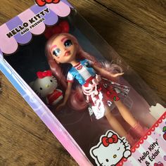 the hello kitty doll is in its box