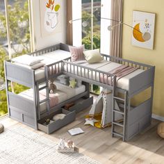 a child's bedroom with bunk beds and a loft bed in the corner, next to a window