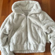 Brand New Fleece Soft Coat - Size Small Cozy Fit White Outerwear For Fall, Cozy Fit Winter White Outerwear For Loungewear, Cozy Fit White Winter Outerwear, White Cozy Fit Winter Outerwear, White Cozy Fit Outerwear For Winter, White Fleece Outerwear For Loungewear, White Fleece Jacket With Ribbed Cuffs, Cozy White Outerwear For Loungewear, White Fleece Outerwear With Fleece Lining