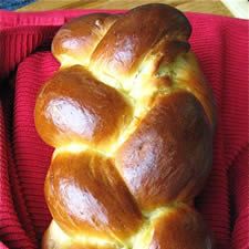 a loaf of bread sitting on top of a red cloth