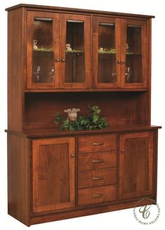 a wooden cabinet with glass doors and drawers