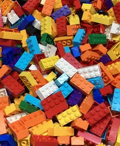 many different colored legos are scattered together