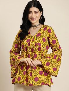 * Floral Printed Pure Cotton Kurti Printed Kurti / Embroidered Short Kurti / Indian Tunic / Summer-Spring Evening Dress / Cotton Tunic Tops Boho Tunic / Hippie Dress / Tribal Print Top * Yellow and pink a-line kurti * Floral printed * V-neck, long, bell sleeves * Machine pure cotton *Fabric:-  Pure Cotton *Wash Care:-  Machine Wash AVAILABLE IN 7 SIZES THEY ARE IN FOLLOWING MEASUREMENTS IN INCHES:- XS:- Bust-34/Waist-28/Length-32 S:- Bust-36/Waist-30/Length-32 M:- Bust-38/Waist-32/Length-32 L:- Bust-40/Waist-34/Length-32 XL:- Bust-42/Waist-36/Length-32 XXL:- Bust-44/Waist-38/Length-32 3XL:- Bust-46/Waist-40/Length-32 NOTE ►►CUSTOMISATION We do customisation ️ ►►TRACKING We give full tracking to our valuable customers, you can track your package any time with tracking code provided by our s Yellow Printed Kurta For Spring, Yellow Printed Long Sleeve Kurta, Yellow Printed Long-sleeve Kurta, Traditional Yellow V-neck Kurta, Yellow V-neck Traditional Kurta, Yellow Bohemian Kurta With Floral Print, Festive Yellow Tops With Printed Motifs, Spring Yellow Tops With Printed Motifs, Traditional Printed Yellow Tops