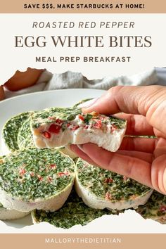 egg white bites with spinach and red pepper on top are being held up by someone's hand