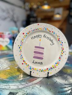 Pottery Painting Fun 🎨 #birthdaycakeplate #paintyourownpottery #paintyourownplate Painting Pottery Plates Ideas, Paint Your Own Plate Ideas, Happy Birthday Pottery Plate, Homemade Birthday Plate, How To Paint A Plate, Happy Birthday Ceramic Plate, Ceramic Birthday Plate Diy