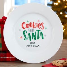 a white plate with cookies for santa on it