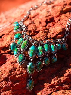 This was one fun necklace to build and one of my favorite items to shoot! These necklaces showcase Sonoran turquoise, in a beautiful mix of bright blue, forest greens and brilliant copper. Can be worn as a choker or 22 inch long necklace with the 4 inch fall reaching about 26 inches on the longest setting. These are all handmade, down to the chain, just amazing works of art. Hand-picked to create a unique, heirloom quality piece that you will enjoy for years to come. Gem quality turquoise set in sterling silver and linked together to lay harmoniously around your neck. Waterfall Necklace, Blue Forest, Cool Necklaces, Pendant Rings, Art Hand, Cuff Earrings, Just Amazing, Hand Picked, Bright Blue