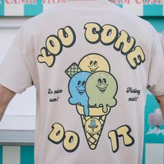 Men's printed t-shirt with “You Cone Do It” slogan and vintage ice cream cone character graphic. Small logo on front, large back print.You'll feel mint in this vintage style graphic tee. Slouchy fit. Makes a great gift and a sweet self purchase for summer staycation. All Batch1 products are lovingly designed, printed and packed by hand in the UK at Batch1 HQ.Our garments are made to order to minimise wastage and printed using water-based, eco-friendly inks. We are committed to creating on-trend, Ice Cream Shirt Ideas, Ice Cream Graphic, Groovy Aesthetic, Ice Cream Shirt, Clever Halloween, Summer Staycation, Clever Halloween Costumes, Style Graphic Tee, Slogan Sweatshirt