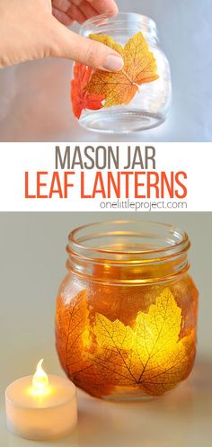 a mason jar filled with leaf lanterns next to a candle